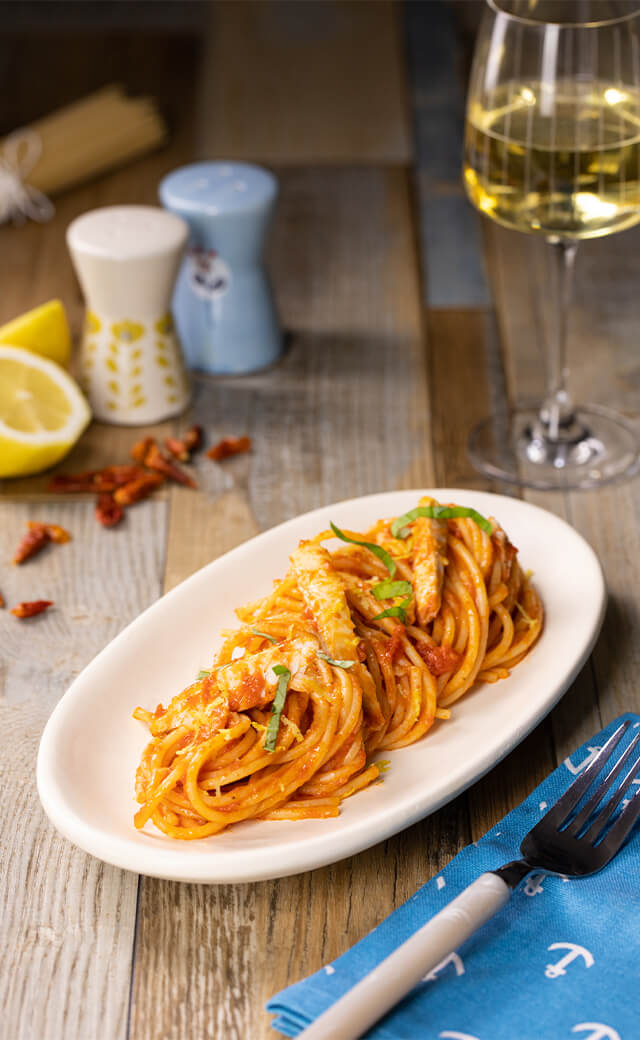 Spaghetti con ragù</br> di branzino