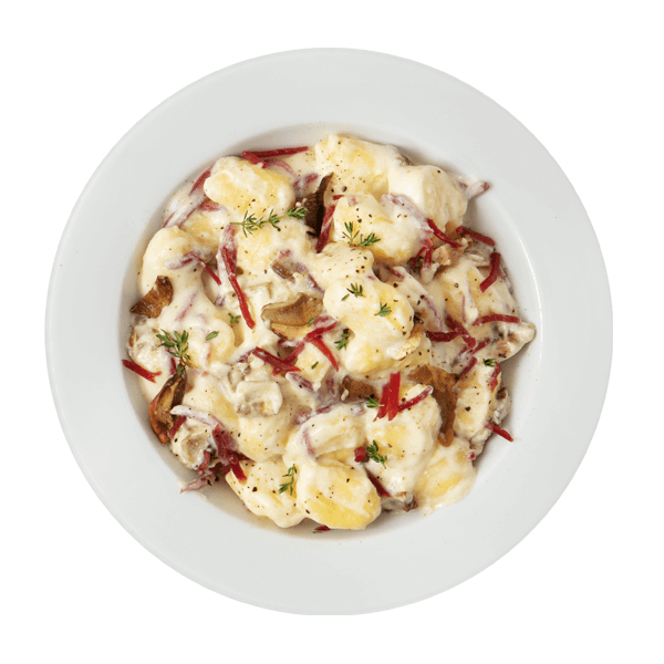 Gnocchi con funghi porcini, robiola e bresaola