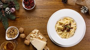 Penne mais e riso con pesto di grana e noci