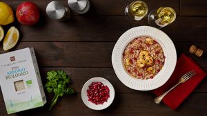 Risotto al franciacorta con gamberi e melagrana